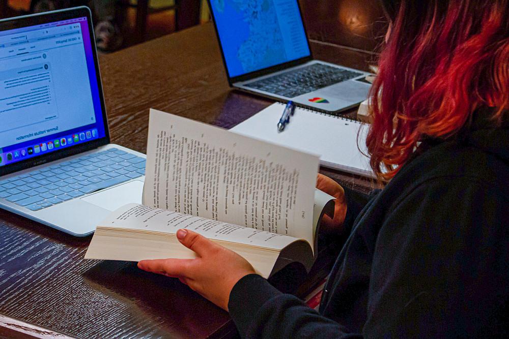 A student reading Joyce's Ulysses in Shawn Gillen's class.